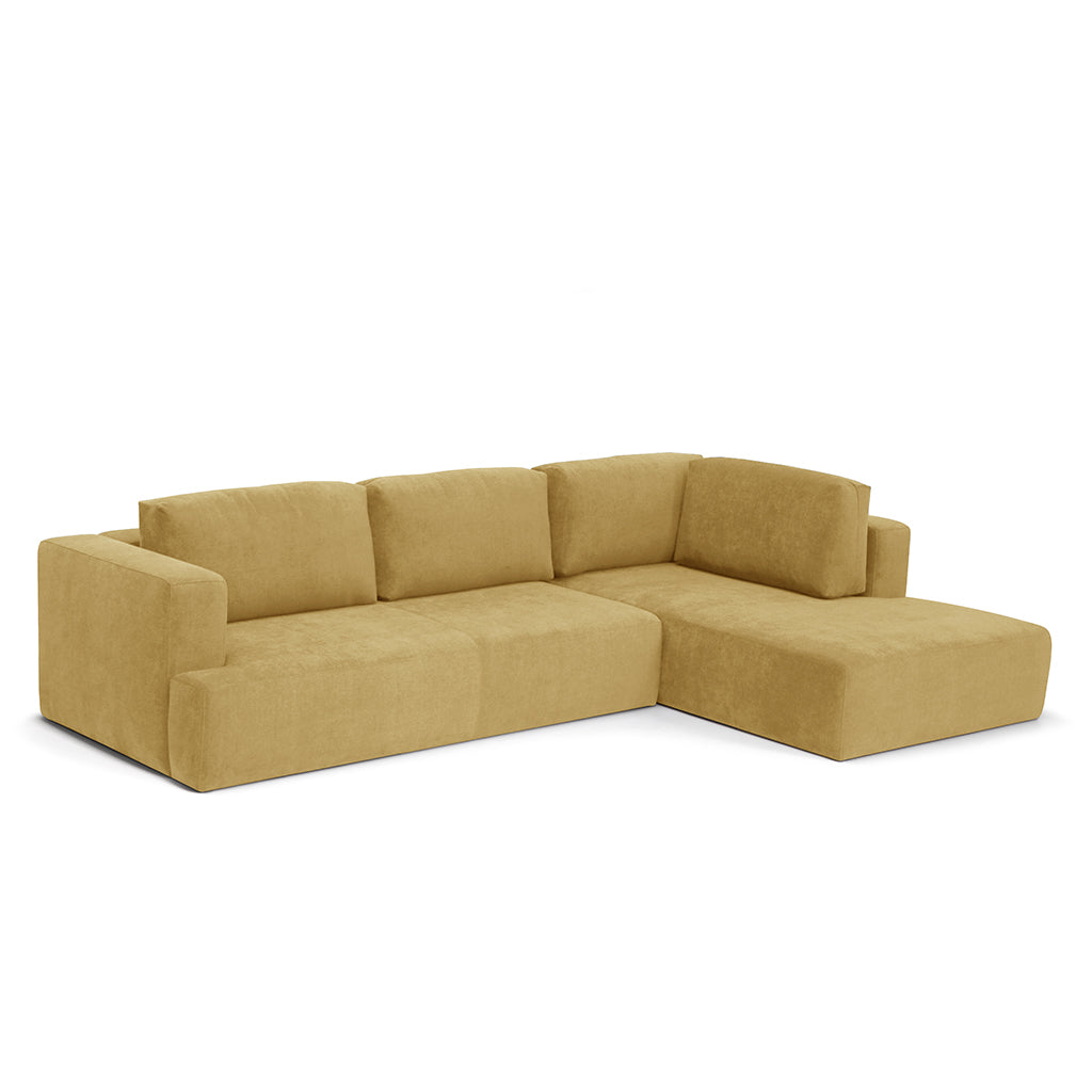 Sofá Blazer com chaise longue em tecido claro, design moderno e minimalista para sala contemporânea