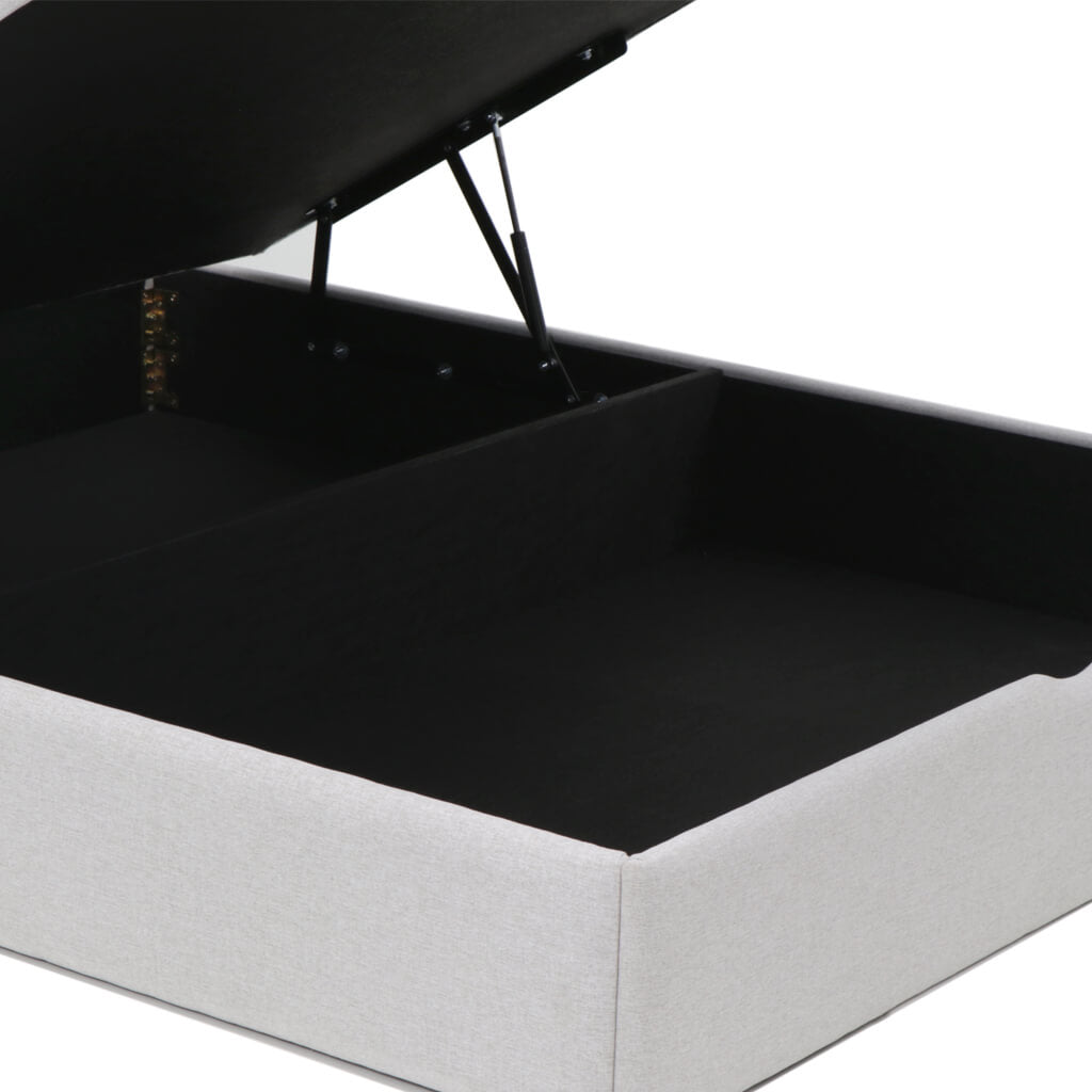Sommier cinzento com arrumação em sistema elevatório, prático e fácil de usar.